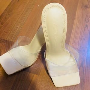 Nude heels with clear strap. Worn once!